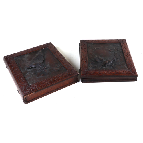 300 - A 19th century  Austrian lap desk and matching box, both having bronze panels decorated in relief wi... 