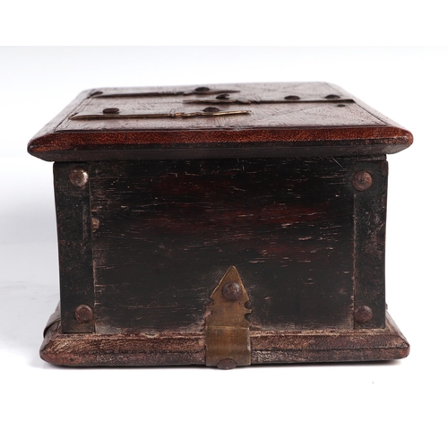 304 - A 19th century mahogany box with brass strapwork decoration, 24cm wide.