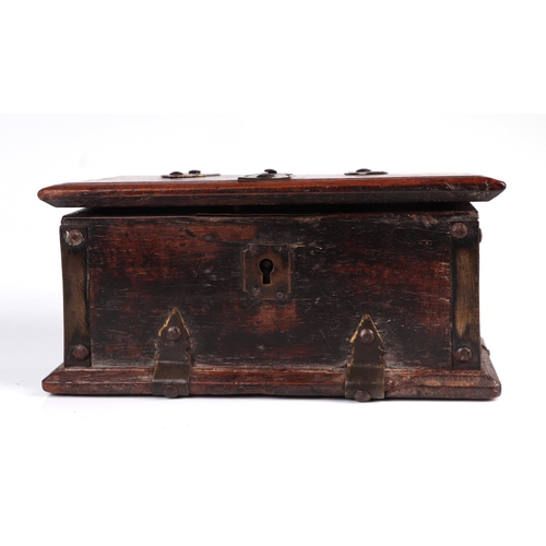 304 - A 19th century mahogany box with brass strapwork decoration, 24cm wide.