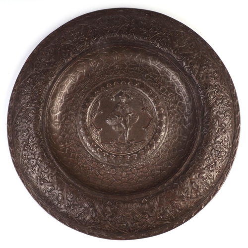 305 - A 19th century historicist cast iron circular charger in the renaissance revival taste with central ... 