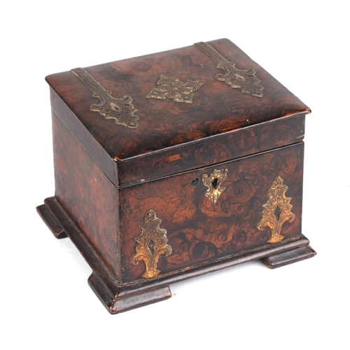 323 - A 19th century brass mounted faux burr walnut painted tea caddy with internal lid, 13cms wide.