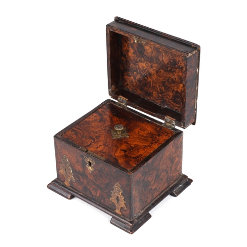 323 - A 19th century brass mounted faux burr walnut painted tea caddy with internal lid, 13cms wide.