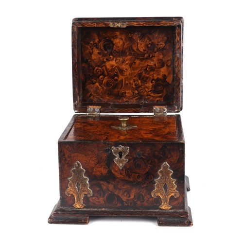 323 - A 19th century brass mounted faux burr walnut painted tea caddy with internal lid, 13cms wide.