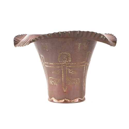 327 - A punch decorated copper vase in the form of an upturned conical hat, decorated with a fence and cat... 