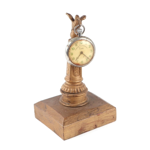 336 - A gilt metal pocket watch stand together with a Duke Railway Timekeeper open face pocket watch