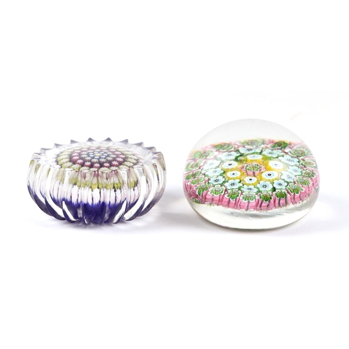 38 - A Baccarat style paperweight with floral canes, 6cms diameter; together with another similar, 6cms d... 