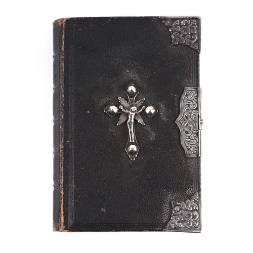 388 - A Bagster's Polyglot white metal mounted bible.