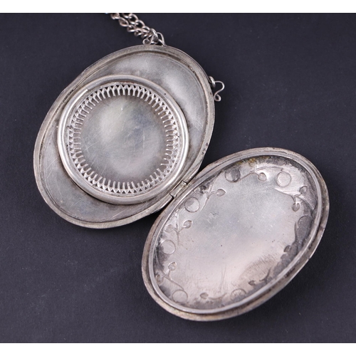 397 - A Victorian silver and moonstone locket on chain, marks rubbed and indistinct, 33g.