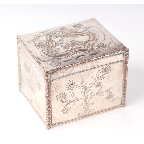 405 - An 18th century Sheffield plate tea caddy with embossed and engraved decoration, 10cms wide.