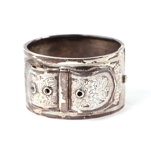 416 - A late Victorian silver bracelet or cuff in the form of a buckle, 49g, 6cms diameter, Chester 1896.