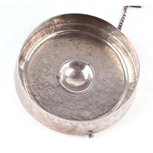 430 - A South East Asian white metal (tests as silver) gong with foliate decoration, 15cm diameter, 202g