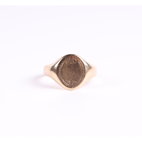 446 - A 9ct gold gentleman's signet ring with oval panel, approx UK size 'T'; together with another simila... 