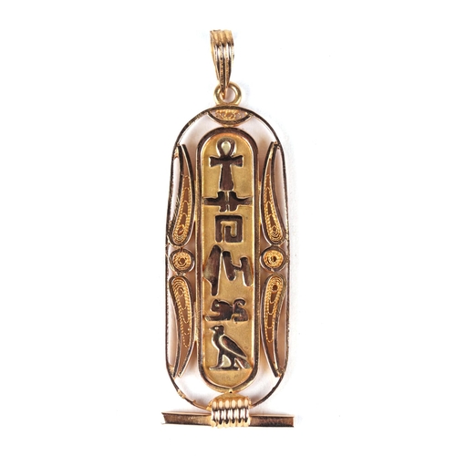 449 - An Egyptian yellow metal hieroglyph pendant 5cm high, 6.5g