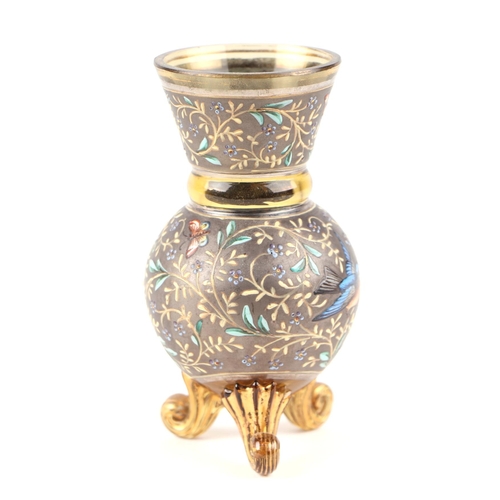 45 - A Moser enamel tripod vase decorated with scrolling flowers and butterflies, 11cms high.