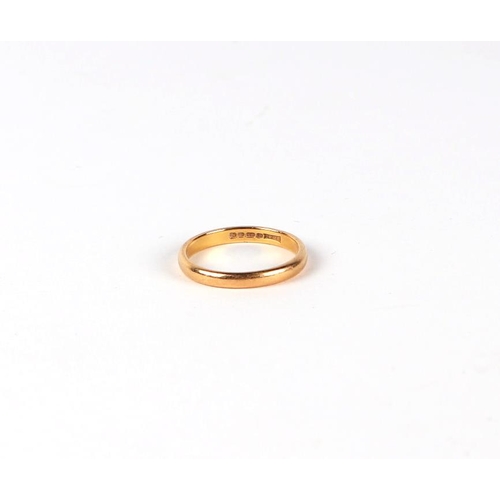 450 - A 22ct gold wedding band, approx UK size N, 3.1g