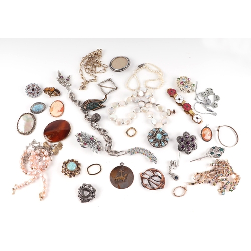 458 - A quantity of costume to include necklaces, brooches and cufflinks.