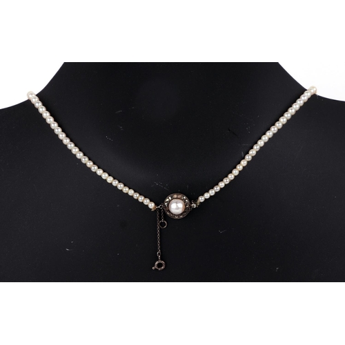 459 - A graduated pearl necklace with sterling silver pearl and marcasite clasp, total length 42cms.