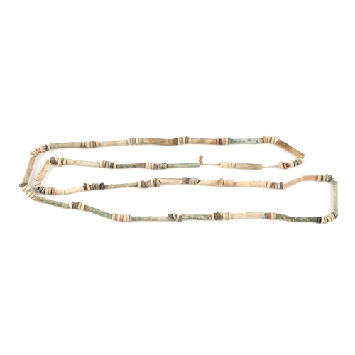 460 - Antiquities.  An ancient Egyptian faience bead necklace, 70cms long.