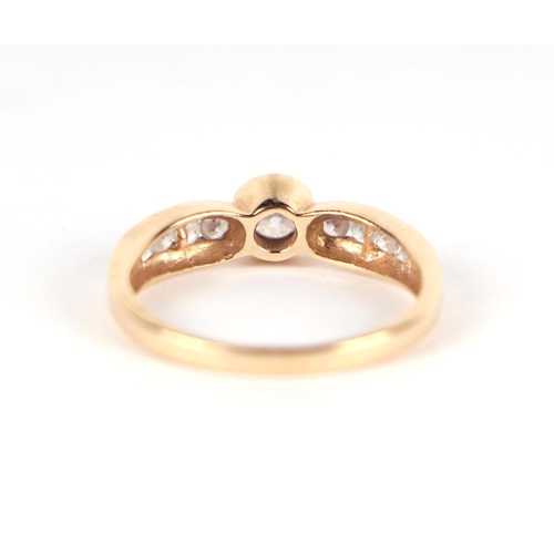 468 - A 14ct gold cubic zirconia dress ring, approx UK size 'O', 2.6g.