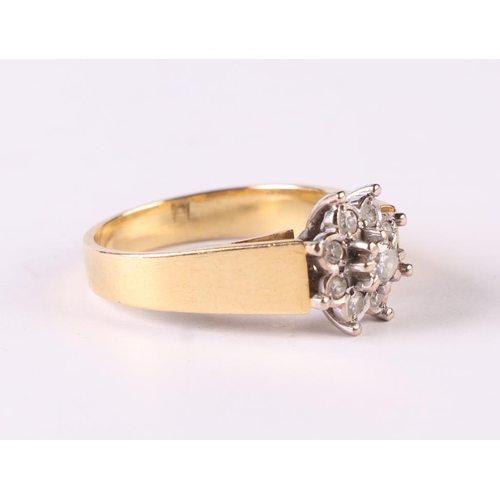 472 - An 18ct gold and diamond flower head cluster ring, approx UK size 'N', 4.9g.