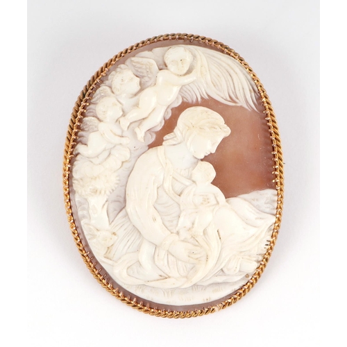 479 - A late 19th century carved shell cameo brooch depicting Mother and Child with winged angels in the c... 