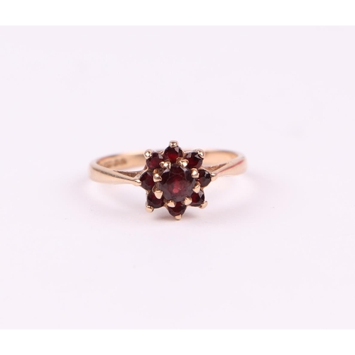 497 - A 9ct gold garnet cluster ring, approx UK size 'L', 1.8g