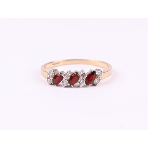 498 - A 9ct gold dress ring set with red and white stones, approx UK size 'S', 1.8g