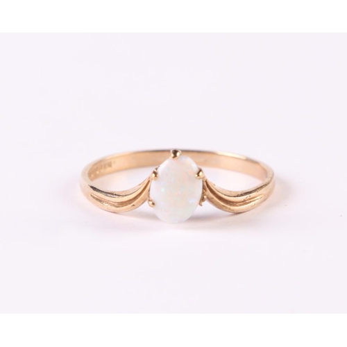 505 - A 9ct gold opal ring, approx UK size 'Q', 1.6g.