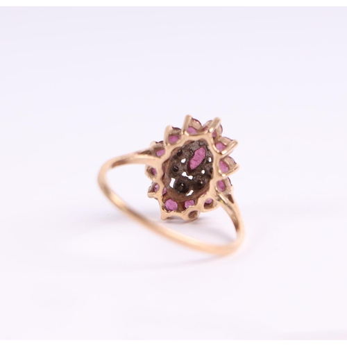 515 - A 9ct gold ruby and diamond cluster ring, approx UK size 'O', 2.2g.