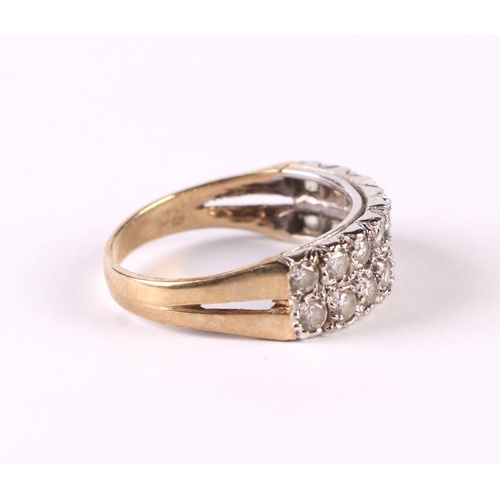 521 - A 9ct gold cubic zirconia dress ring, approx UK size 'M', 3g.