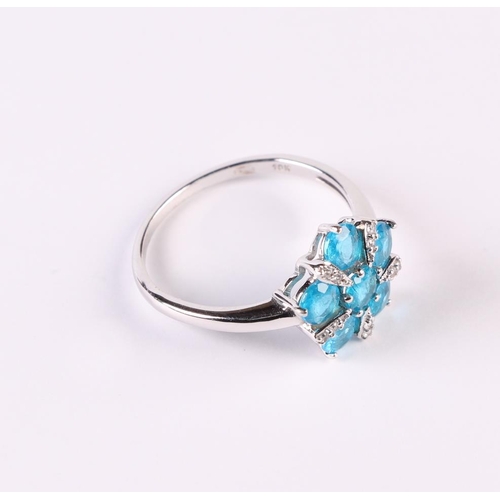 540 - A 9ct white gold daisy cluster ring set with blue apatite and small diamonds, approx UK size Q, 2.6g... 