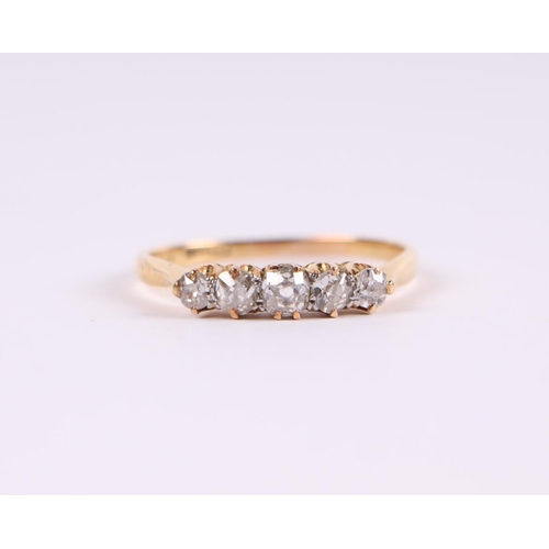 562 - An 18ct gold five-stone diamond ring, approx UK size 'P', 2.5g.