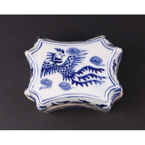 626 - A Chinese blue & white shaped rectangular box and cover, the cover decorated with a phoenix, blue ch... 