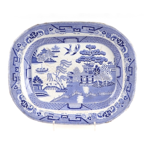 63 - A group of seven blue and white meat plates, largest 51cm wide together with two shaped side dishes,... 