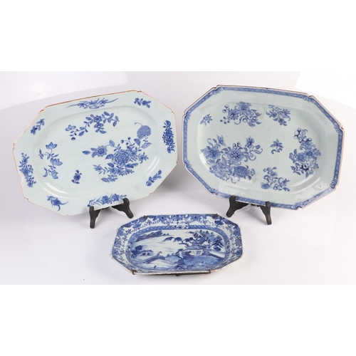 640 - Three 18th century Chinese blue & white meat plates of octagonal form decorated with a river landsca... 