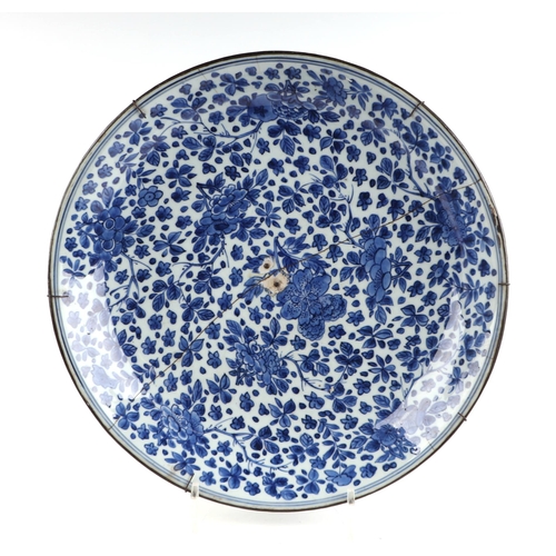 643 - A large Chinese blue and white shallow bowl, 13.5cm diameter, (riveted repair), a Chinese crackle wa... 