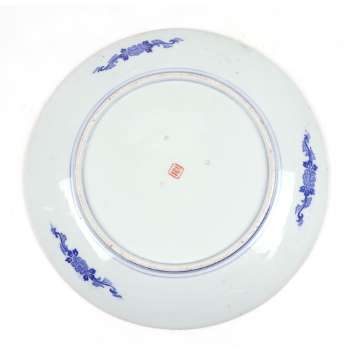 651 - A large Japanese charger decorated with a mountainous landscape scene, 46cms diameter.