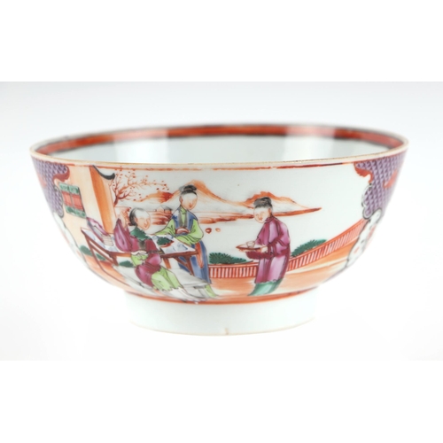 652 - An 18th century Chinese famille rose footed bowl decorated with figures, 17cms diameter.