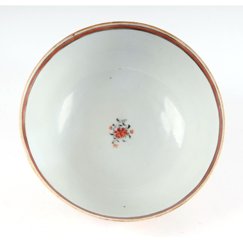 652 - An 18th century Chinese famille rose footed bowl decorated with figures, 17cms diameter.