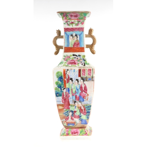 653 - A late 19th century Chinese Canton Export famille rose two-handled vase decorated with figures and f... 