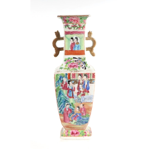 653 - A late 19th century Chinese Canton Export famille rose two-handled vase decorated with figures and f... 