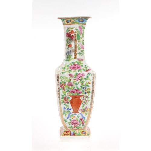 653 - A late 19th century Chinese Canton Export famille rose two-handled vase decorated with figures and f... 