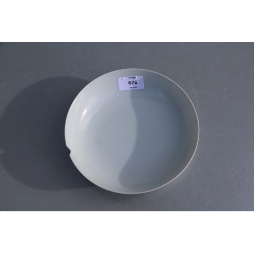 660 - A Chinese white glazed shallow footed bowl, blue six character mark to base, 18cms diameter.Conditio... 