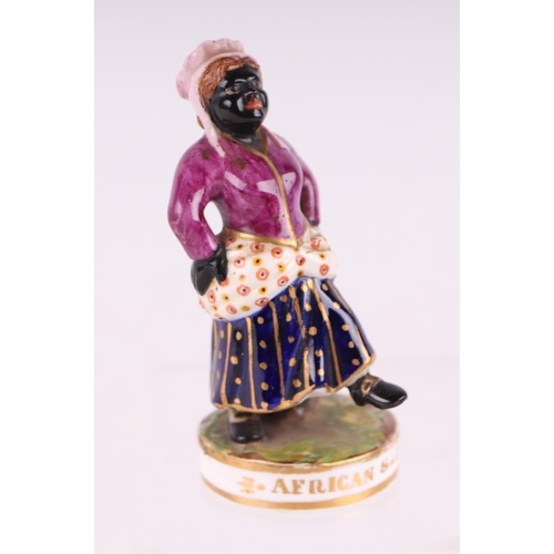 765 - A Sampson & Hancock Derby figure of 'African Sall', 9cms high.