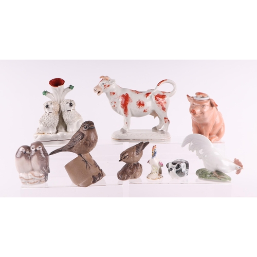 777 - A Collection of Victorian and later ceramic figures to include Royal Copenhagen, a cow creamer, Pool... 