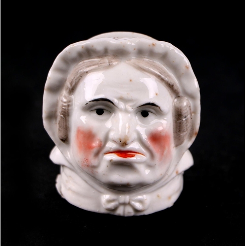 786 - A Staffordshire pottery miniature novelty money box in the form of an old lady wearing a bonnet, 4cm... 