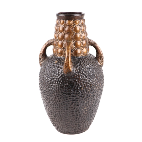 83 - A Bretby Clanta four-handled vase, impressed marks to base, 30cms high.