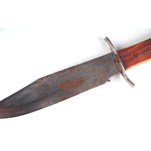 846 - A Bowie knife with 15cms steel blade and antler handle, in a leather sheath.