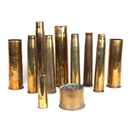 847 - A small collection of WWI brass shell cases, the largest 36cms high (11).