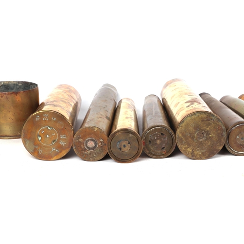 847 - A small collection of WWI brass shell cases, the largest 36cms high (11).